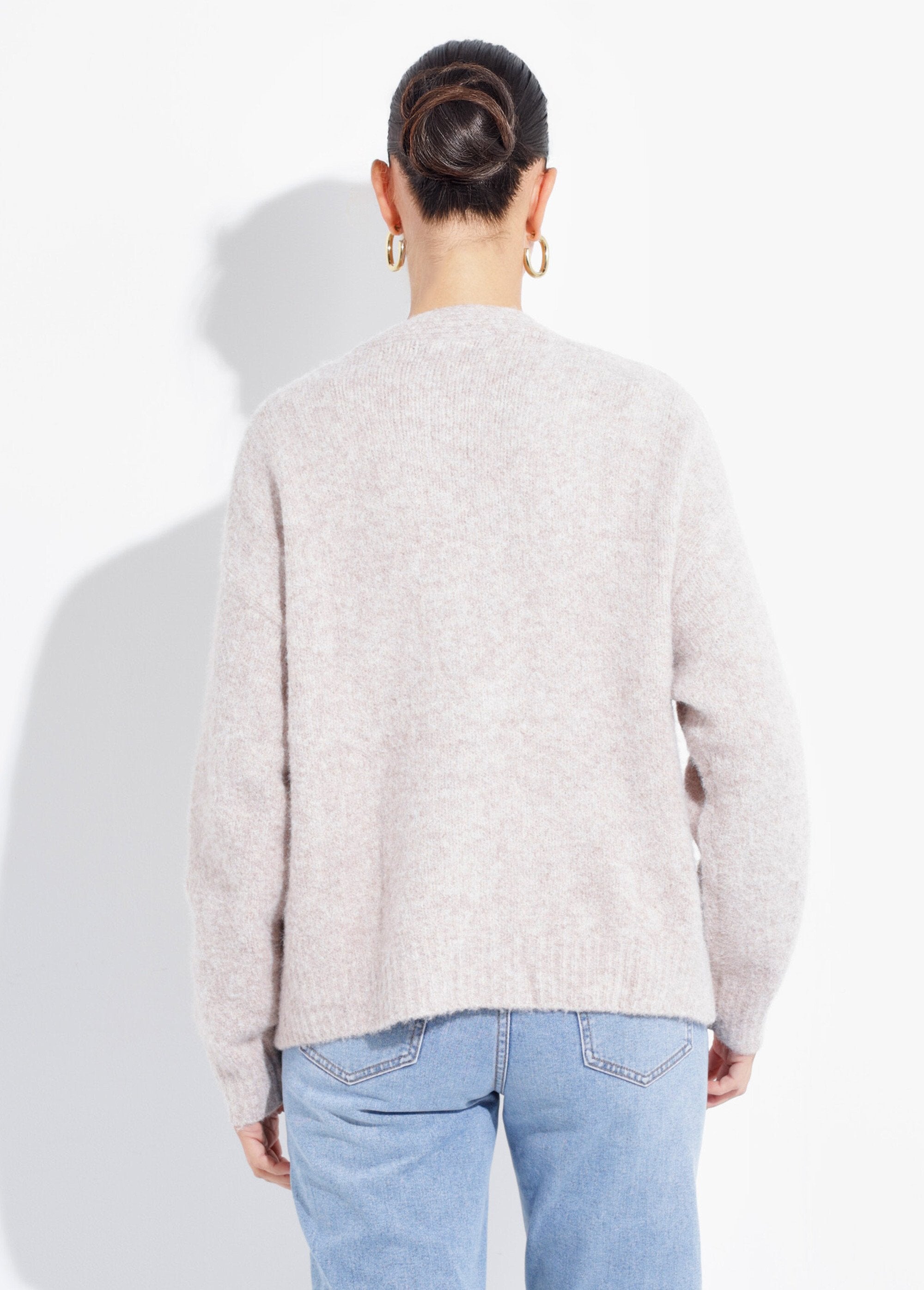 Warm_wollen_vest_met_metalen_knopen_met_juwelen_Beige_DO1_slim