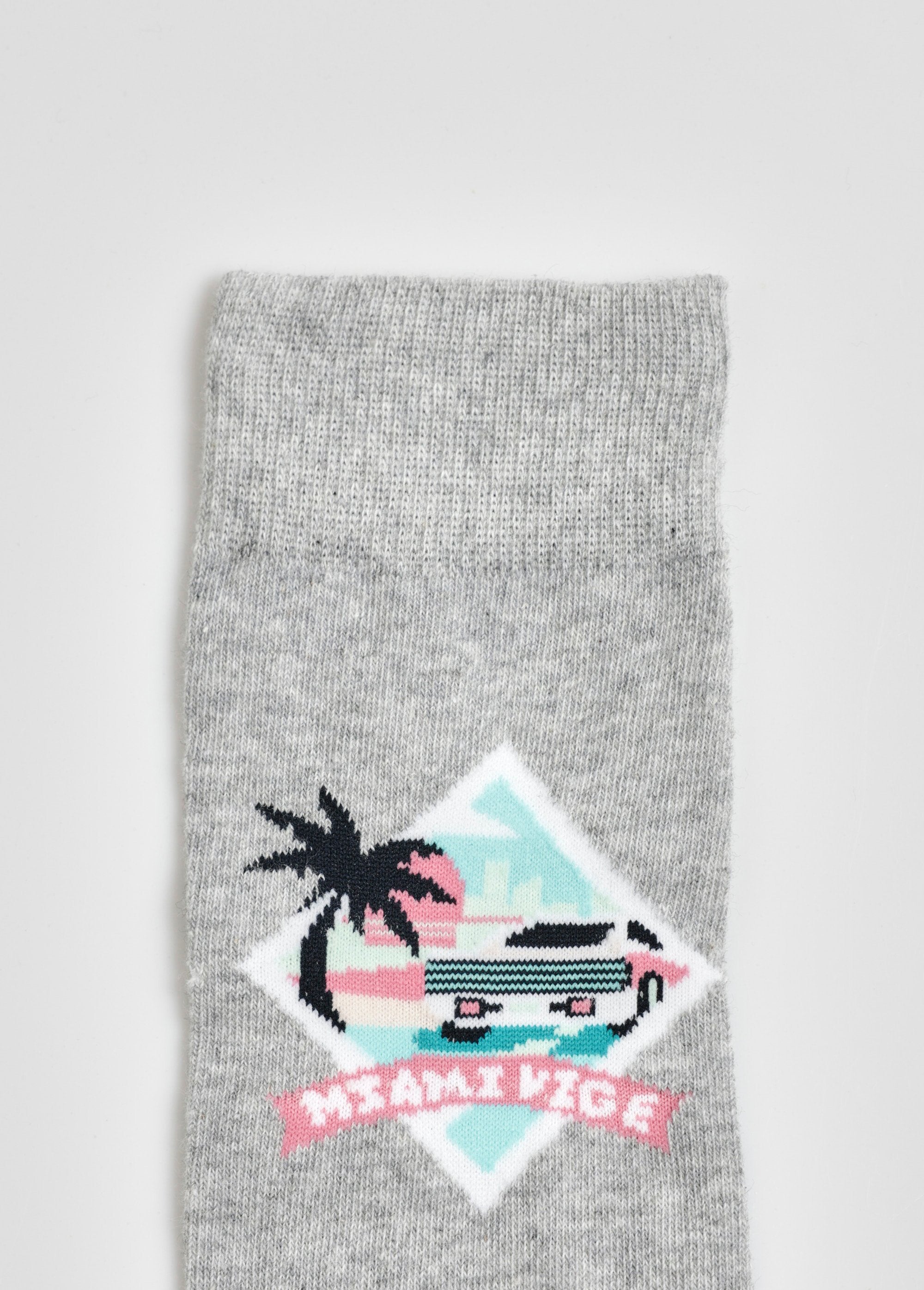 Paar_sokken_met_Miami_Vice-licentie_Gris_et_turquoise_DE2_slim