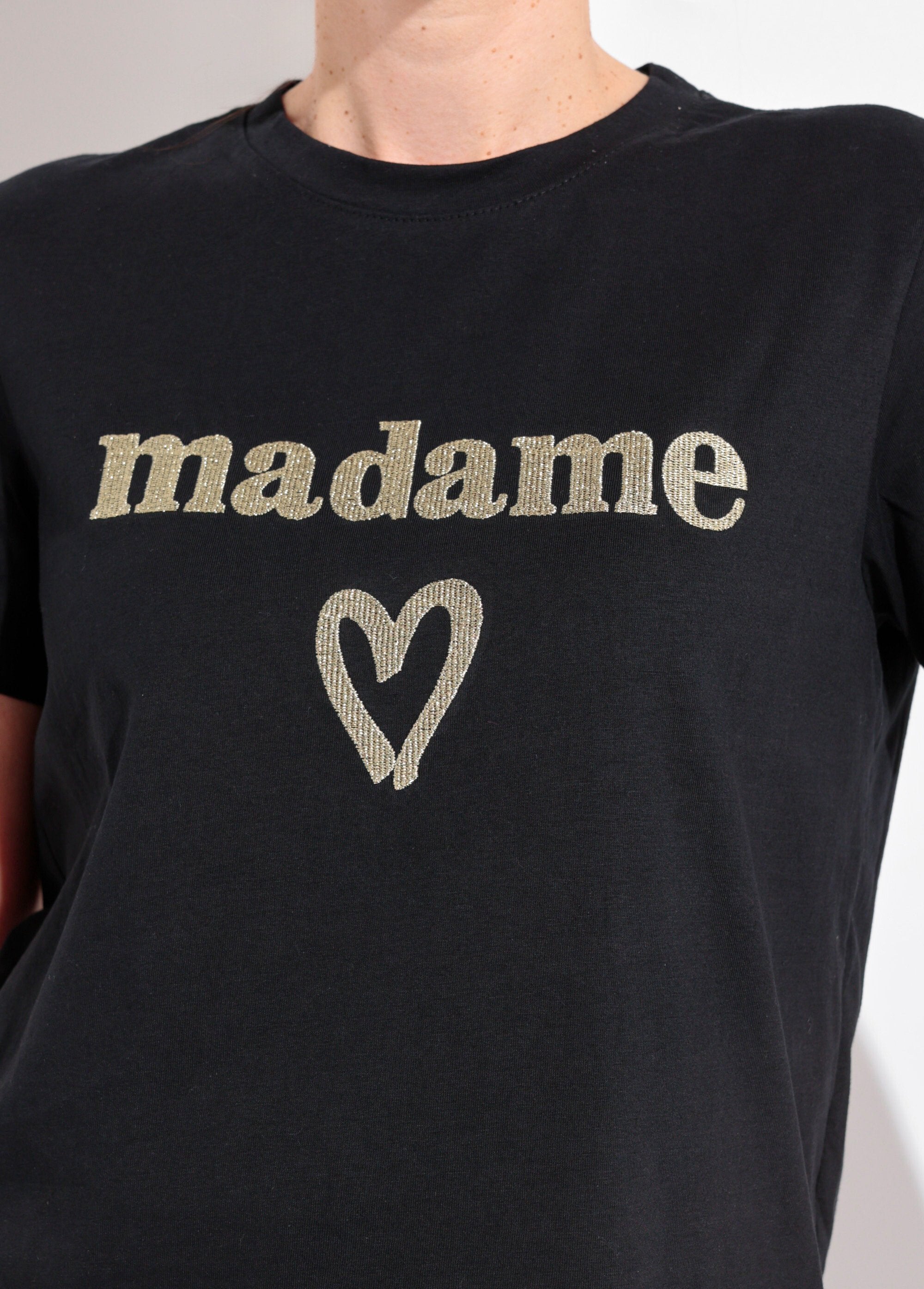 T-shirt_met_ronde_hals_en_metallic_borduursel_Madame_Noir_DE1_slim