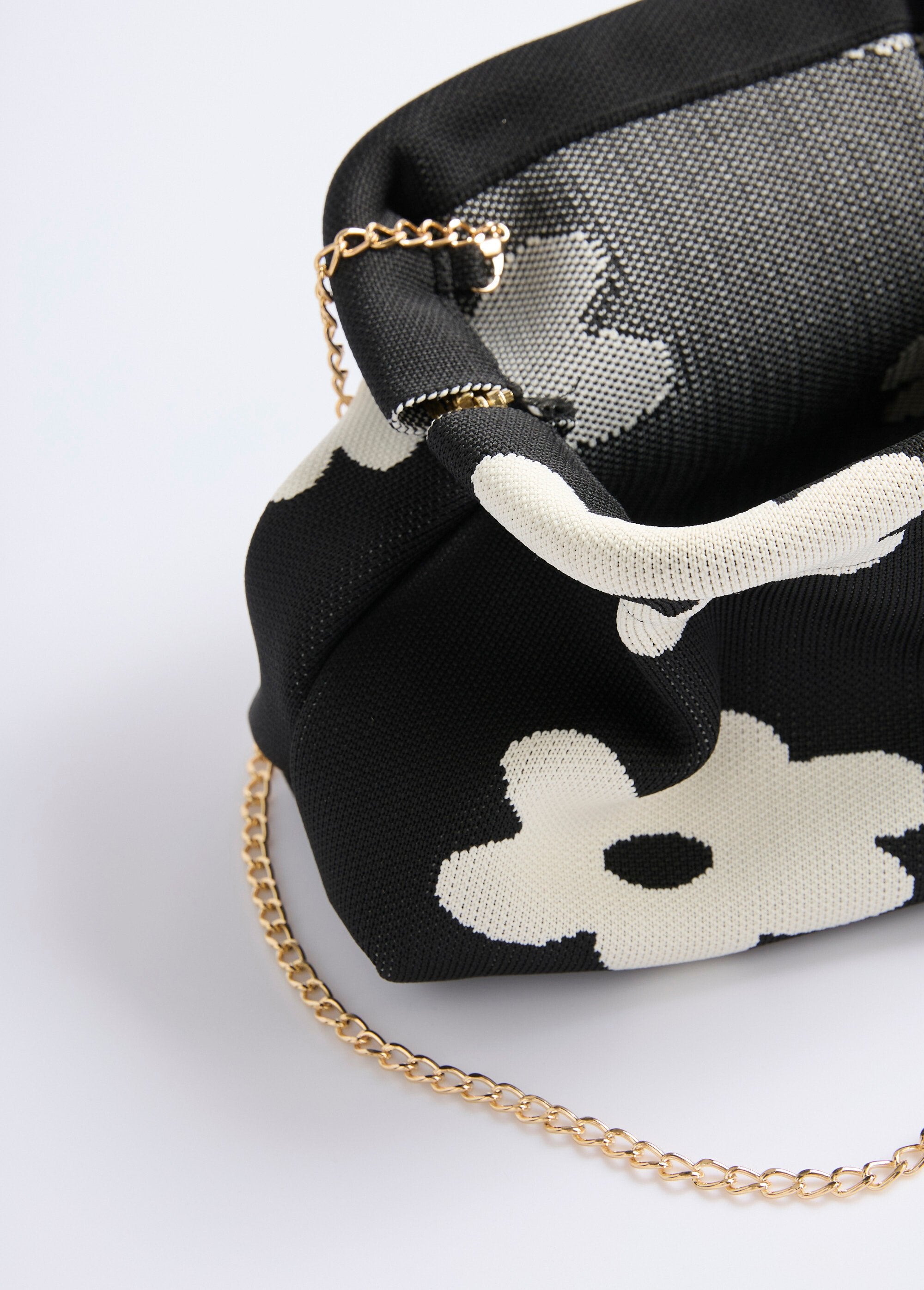 Handtas_van_mesh,_stevige_sluiting_en_ketting_Noir_et_blanc_DE1_slim
