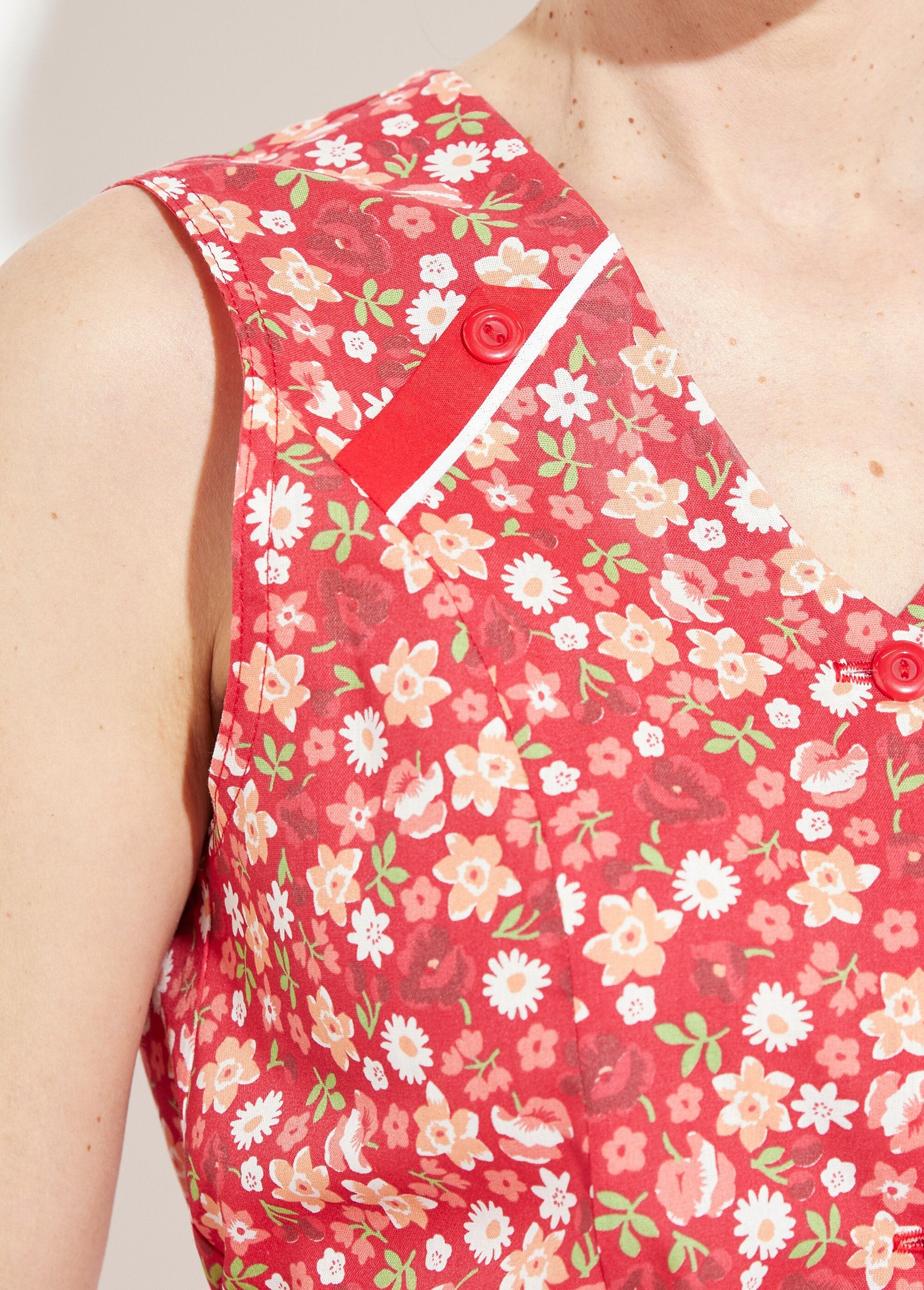 Mouwloos_schort_met_bloemenprint_en_knoopsluiting_Rouge_DE2_slim
